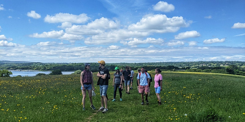 Group of visitors walking at The Community Farm